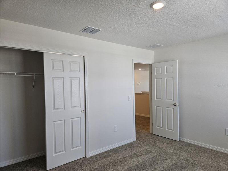 Spacious, unfurnished interior of a new home in Lawson Dunes - Signature Series, Haines City (Image 21).