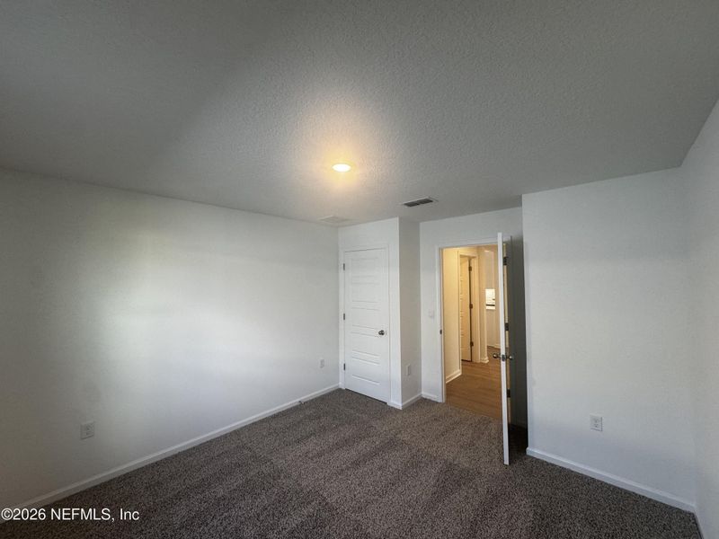 Spacious, unfurnished interior of a new home in The Arbors, Jacksonville (Image 43).