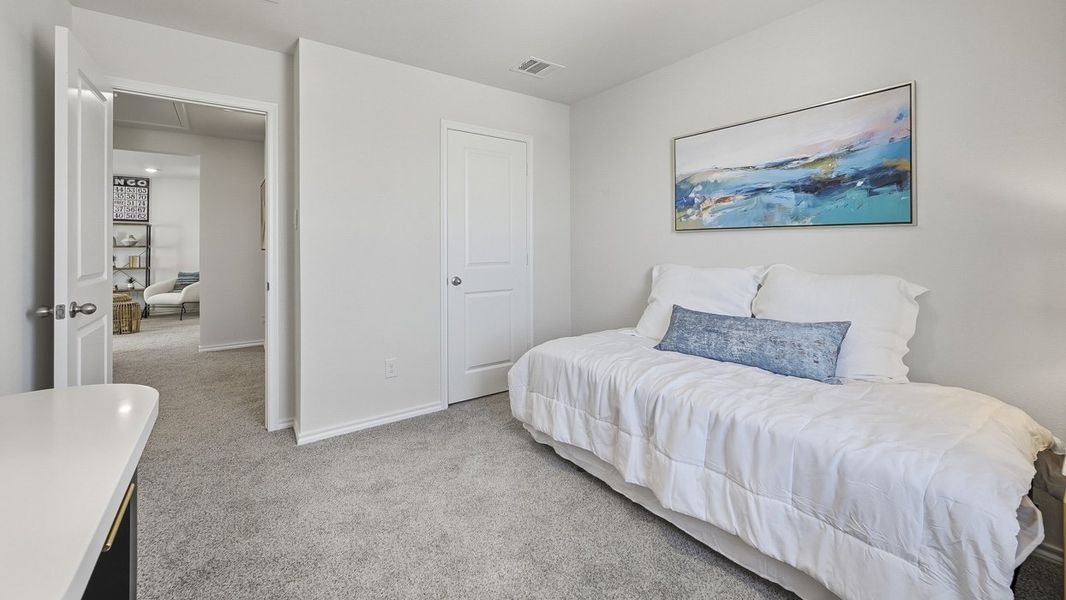 Representative furnished interior of a home built from the Benson by D.R. Horton in Arbor Trails South, Princeton (Image 32).
