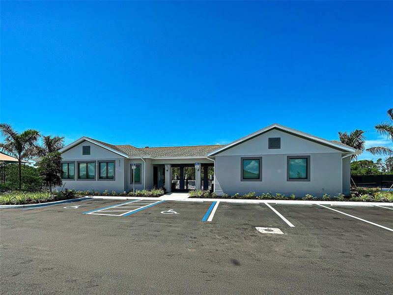 Front exterior of a new home in , Englewood, FL, highlighting curb appeal (Image 1).