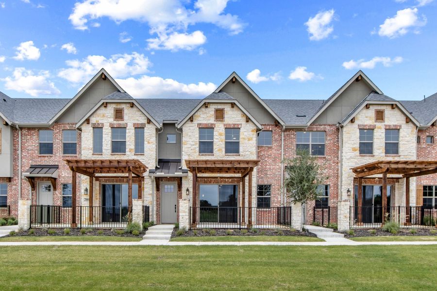 Front exterior of a new home in The Tribute, The Colony, TX, highlighting curb appeal (Image 1). Front exterior of a new home in The Tribute, The Colony, TX, highlighting curb appeal (Image 1).