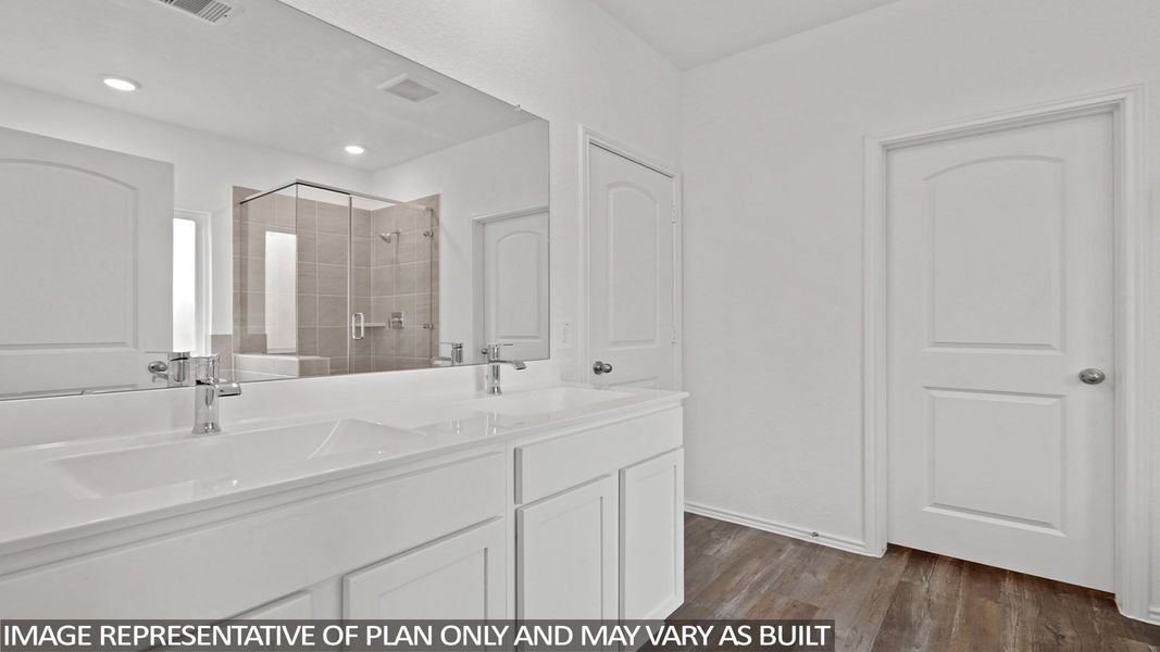 Furnished interior view inside a new home in Sunterra, Katy (Image 7).