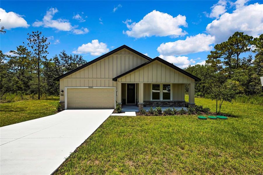 Front exterior of a new home in , Brooksville, FL, highlighting curb appeal (Image 23).