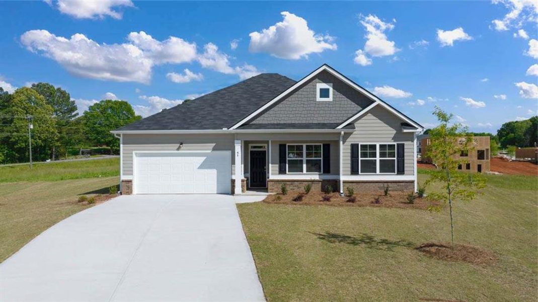 Front exterior of a new home in Preserve at Dove Creek, Statham, GA, highlighting curb appeal (Image 2).