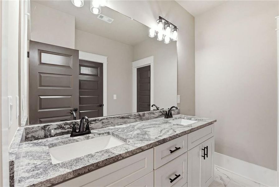 Furnished interior view inside a new home in , Flowery Branch (Image 12). Furnished interior view inside a new home in , Flowery Branch (Image 12).