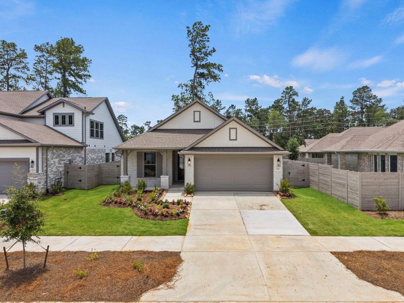 Front exterior of a new home in Two Step Farm, Montgomery, TX, highlighting curb appeal (Image 22). Front exterior of a new home in Two Step Farm, Montgomery, TX, highlighting curb appeal (Image 22).