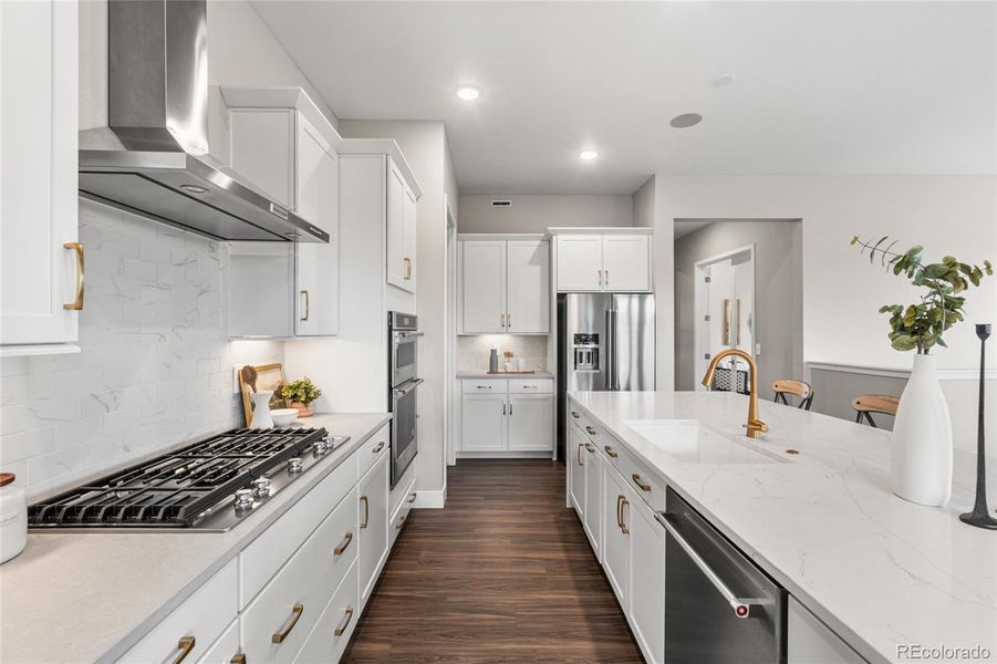 Furnished interior view inside a new home in Hilltop at Inspiration, Aurora (Image 11).