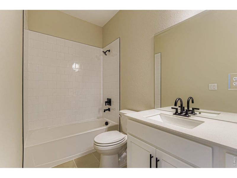 Furnished interior view inside a new home in Farmstead, Berthoud (Image 7).