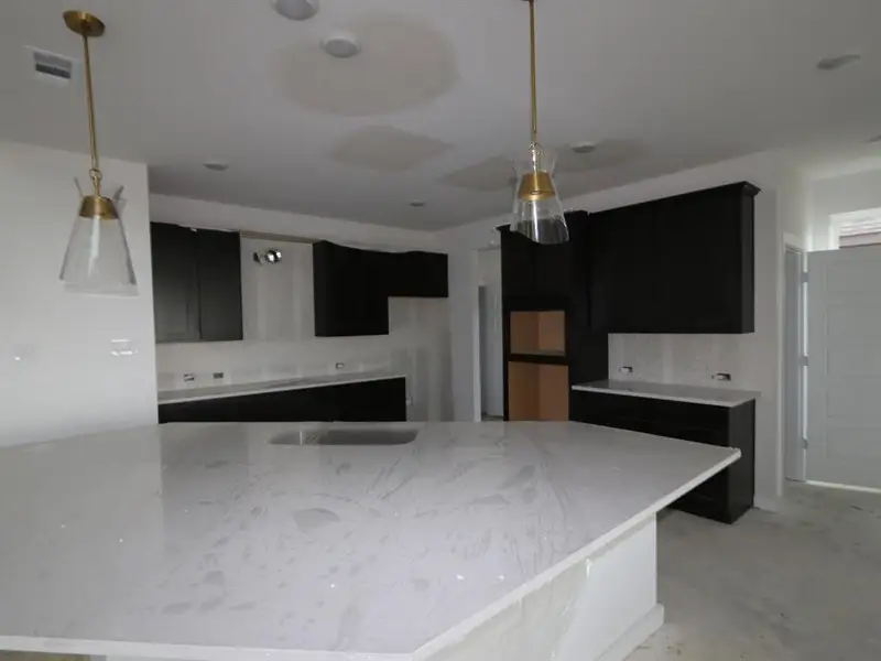 Furnished interior view inside a new home in Marvida, Cypress (Image 8).