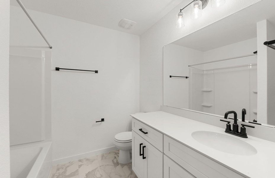 Furnished interior view inside a new home in Sunfield, Buda (Image 9).