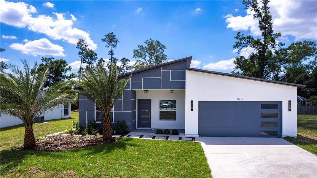 Front exterior of a new home in , Punta Gorda, FL, highlighting curb appeal (Image 19). Front exterior of a new home in , Punta Gorda, FL, highlighting curb appeal (Image 19).