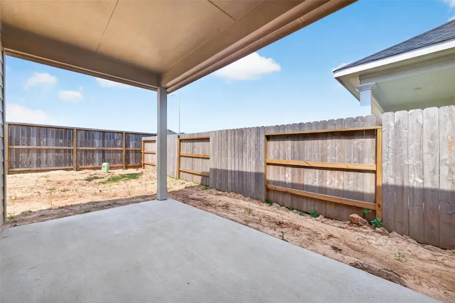 Exterior details and patio area of a home in La Segarra, Brookshire (Image 3).