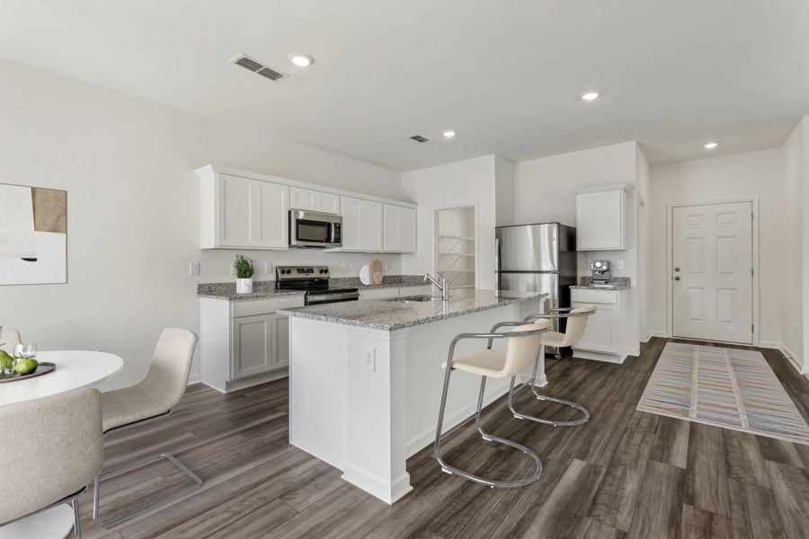Representative furnished interior of a home built from the Neptune by Starlight Homes in Brookshire at Legacy Hills, Celina (Image 5). Representative furnished interior of a home built from the Neptune by Starlight Homes in Brookshire at Legacy Hills, Celina (Image 5).