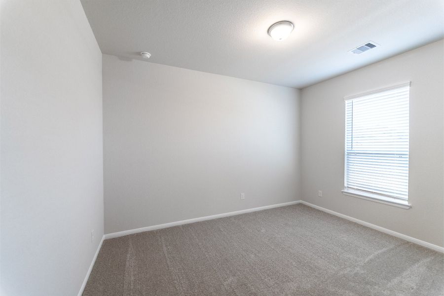 Spacious, unfurnished interior of a new home in Canterra Creek, Rosharon (Image 18).
