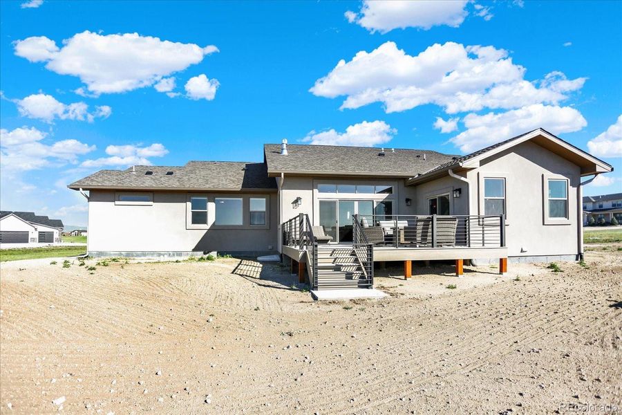 Front exterior of a new home in , Colorado Springs, CO, highlighting curb appeal (Image 26).