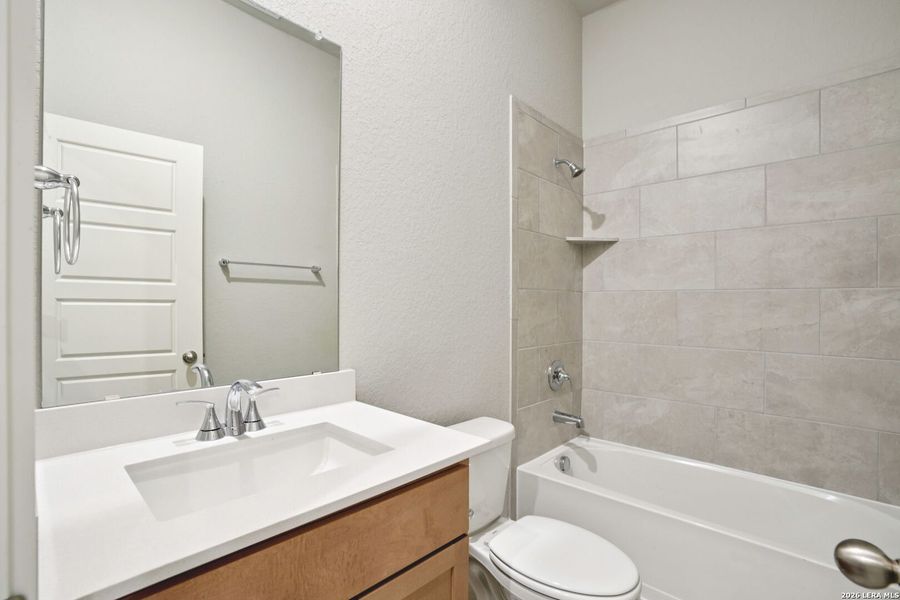 Furnished interior view inside a new home in Estancia Ranch - Classic Series, San Antonio (Image 13).