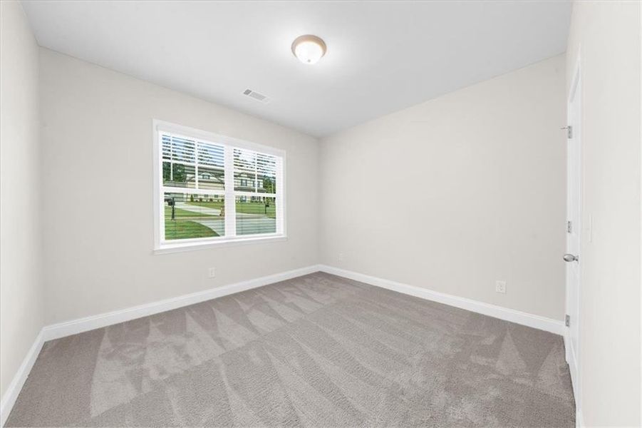 Spacious, unfurnished interior of a new home in River Rock, Ball Ground (Image 20).