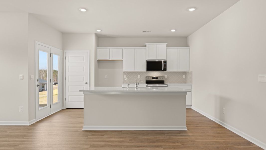 Representative furnished interior of a home built from the Kerry by D.R. Horton in Champion's Run, Lithonia (Image 6).