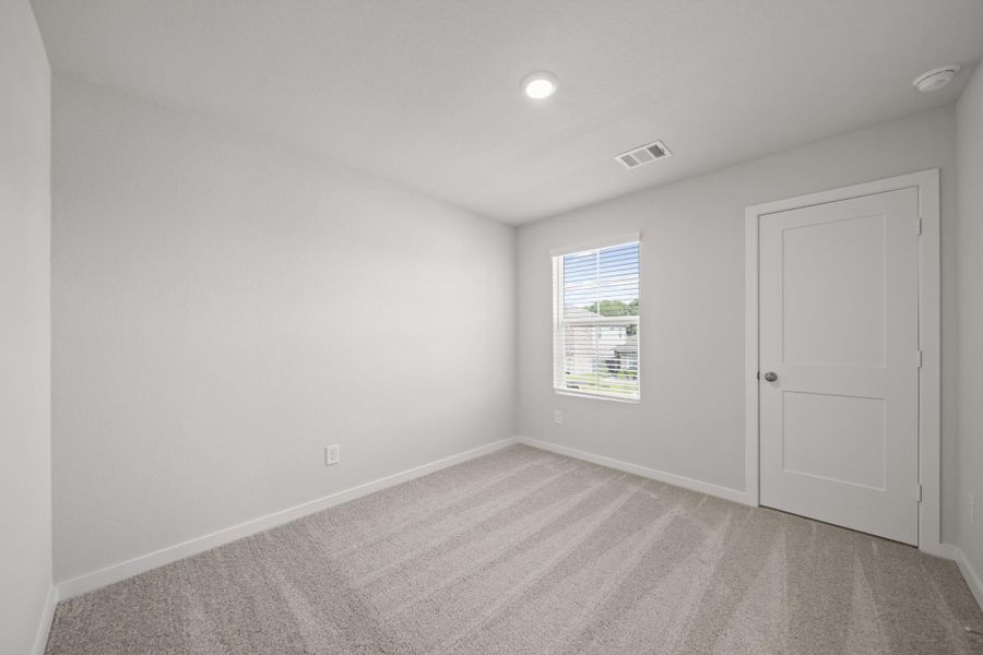 Spacious, unfurnished interior of a new home in Willow Trace 45' at Willow Trace, Spring (Image 19).