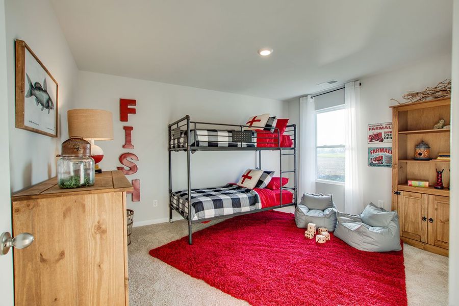 Representative furnished interior of a home built from the SALEM by D.R. Horton in The Parks, White House (Image 30).