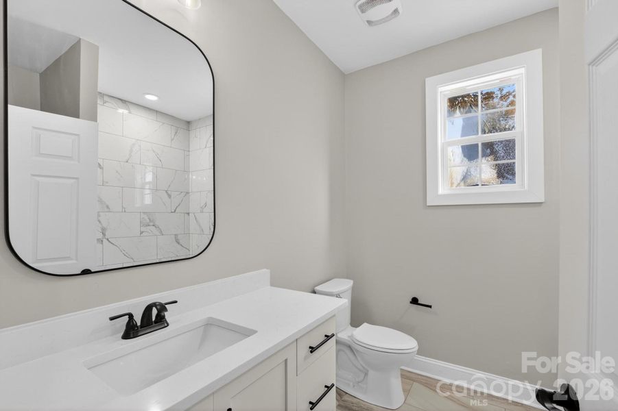 Furnished interior view inside a new home in , Lenoir (Image 28).