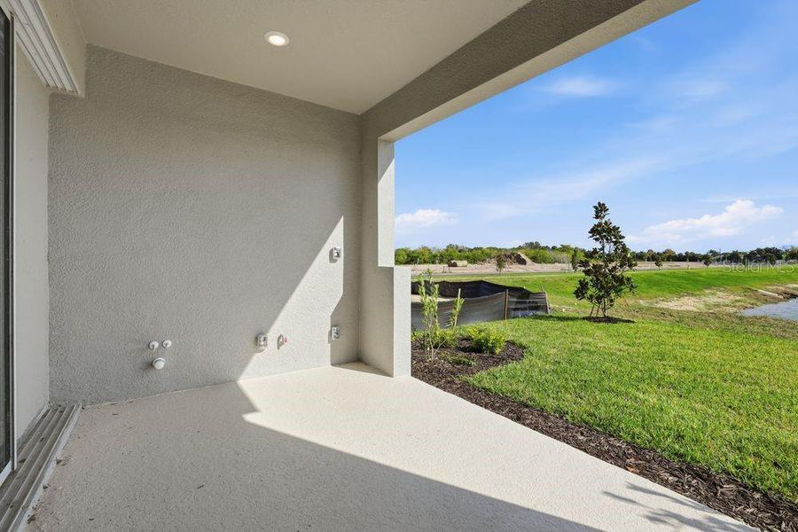 Exterior details and patio area of a home in Indigo Creek, Apollo Beach (Image 3).