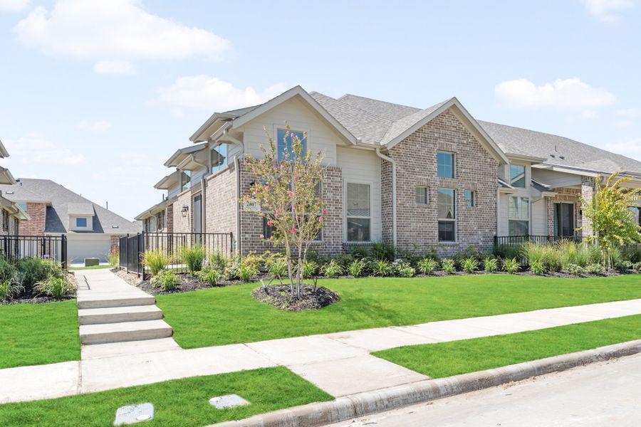 Front exterior of a new home in Woodbridge Villas, Wylie, TX, highlighting curb appeal (Image 28).