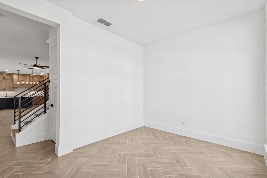 Spacious, unfurnished interior of a new home in Easthaven at Bridgeland Central - Vision Collection, Cypress (Image 21).