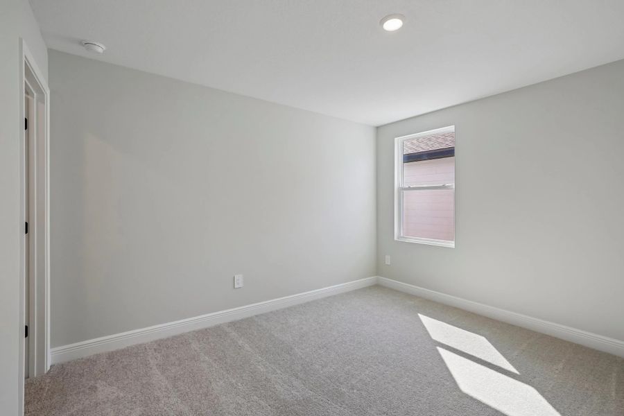 Bedroom 4 located on the other side of bathroom 2 also features a walk-in closet