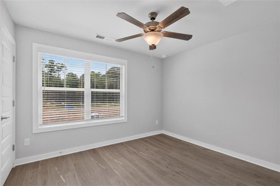 Spacious, unfurnished interior of a new home in The Cottages at East Lanier, Fayetteville (Image 15).