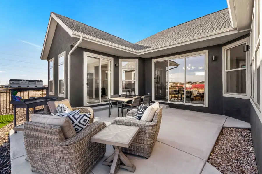 Exterior details and patio area of a home in The Courtyards at Lupton Village, Fort Lupton (Image 3).