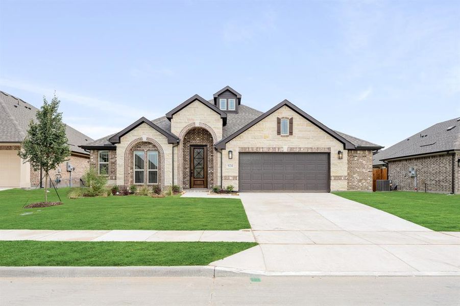 Front exterior of a new home in West Crossing, Anna, TX, highlighting curb appeal (Image 22). Front exterior of a new home in West Crossing, Anna, TX, highlighting curb appeal (Image 22).