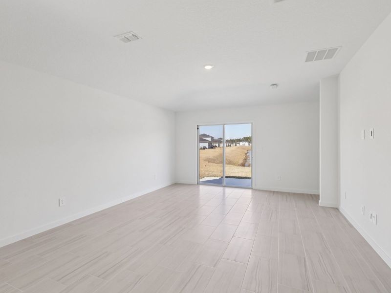 Spacious, unfurnished interior of a new home in Flagler Village - Signature Series, Palm Coast (Image 7).