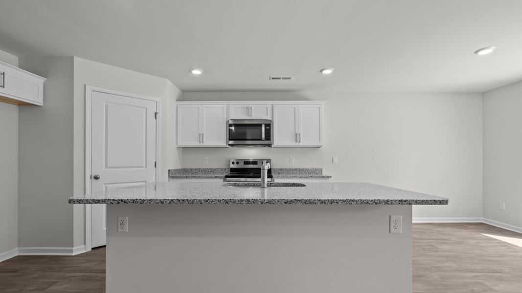 Furnished interior view inside a new home in Blair Ridge, La Grange (Image 5).