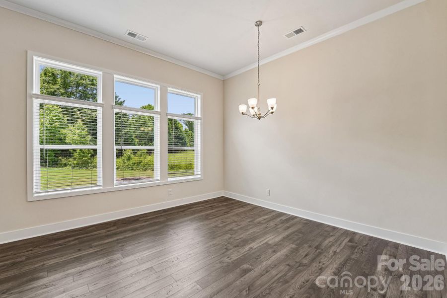 Spacious, unfurnished interior of a new home in Sanctuary at Southgate, Indian Trail (Image 27).