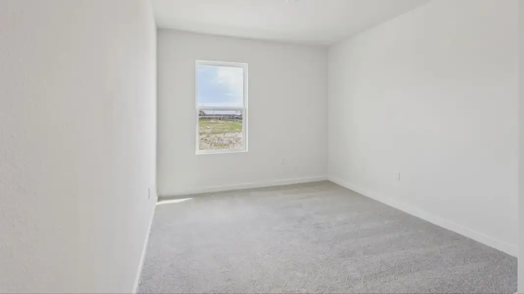 Furnished interior view inside a new home in Willowbrook North, Winter Haven (Image 19).