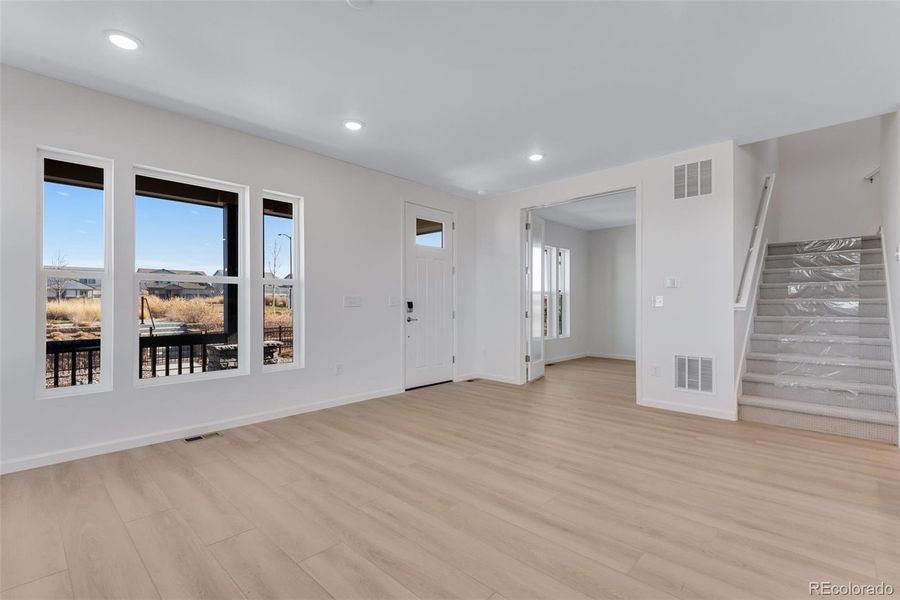 Spacious, unfurnished interior of a new home in Crescendo at The Aurora Highlands, Aurora (Image 27).