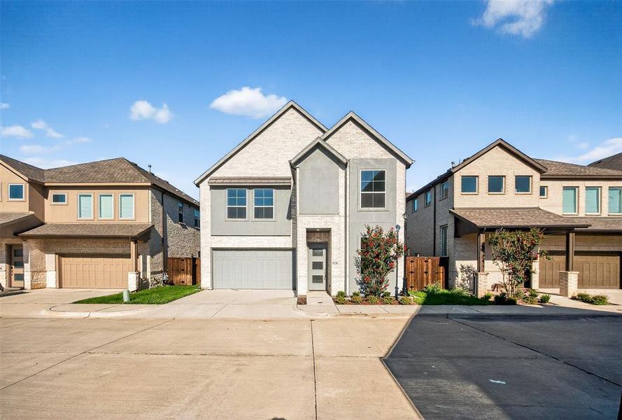 View of front of house featuring concrete driveway, stucco siding, an attached garage, and a residential view View of front of house featuring concrete driveway, stucco siding, an attached garage, and a residential view