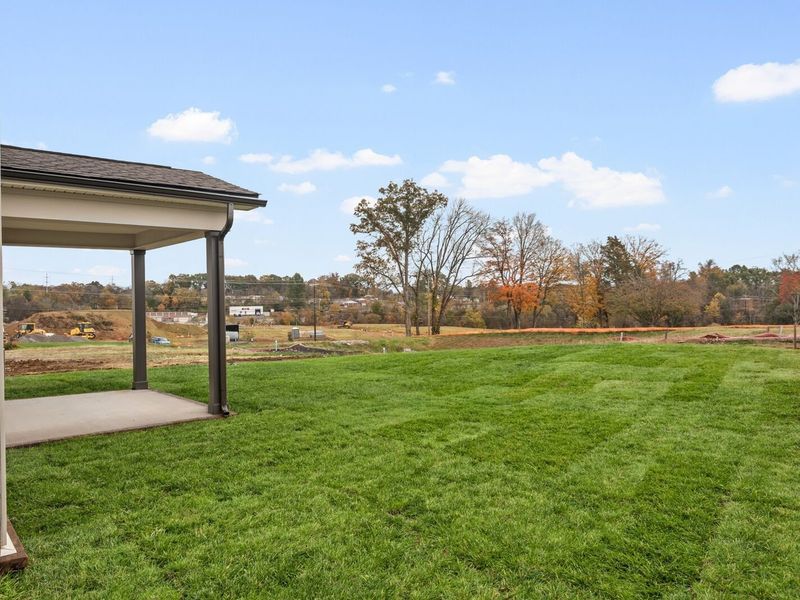 Exterior details and patio area of a home in Woods Crossing, Gallatin (Image 25).