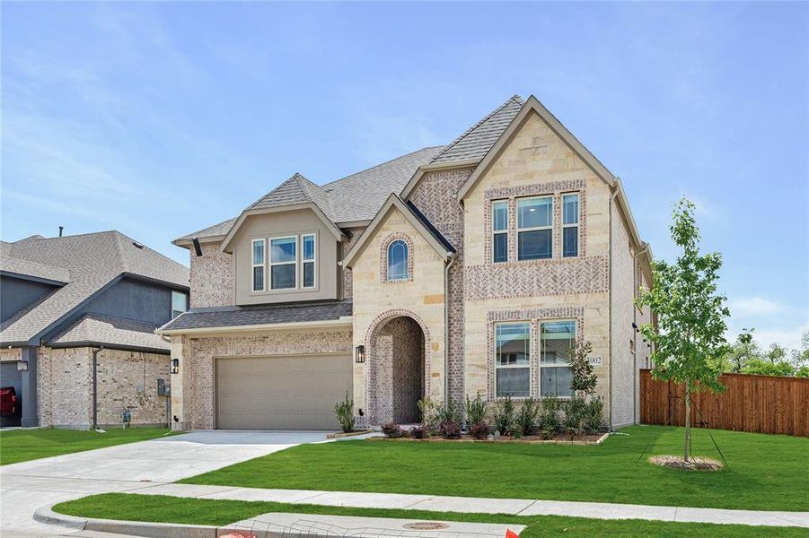 Front exterior of a new home in Liberty, Melissa, TX, highlighting curb appeal (Image 26). Front exterior of a new home in Liberty, Melissa, TX, highlighting curb appeal (Image 26).