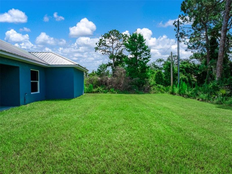 Exterior details and patio area of a home in , Sebring (Image 19). Exterior details and patio area of a home in , Sebring (Image 19).