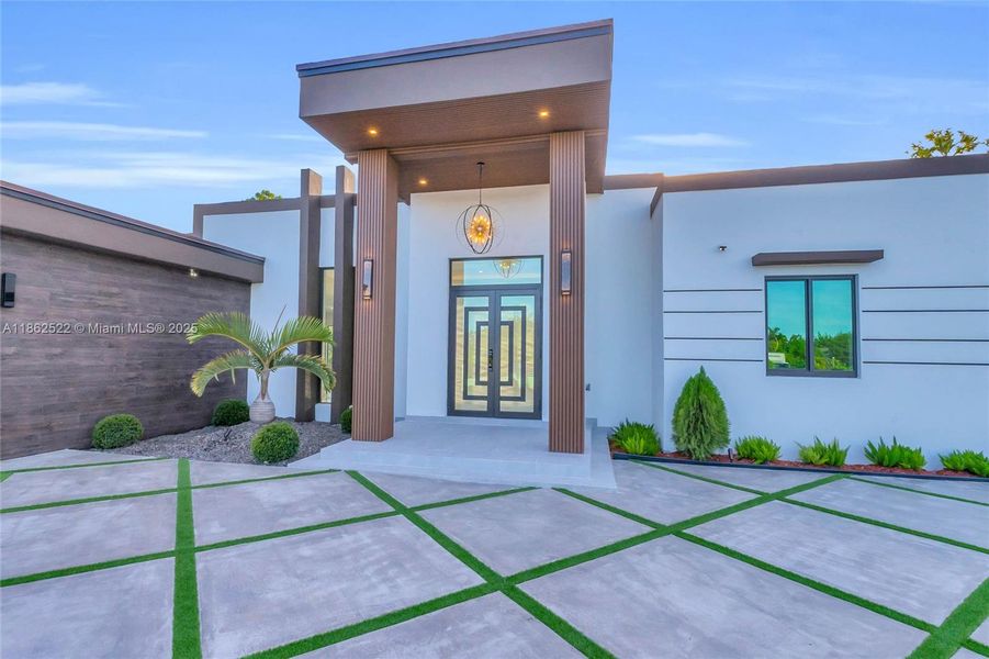 Front exterior of a new home in , Homestead, FL, highlighting curb appeal (Image 26).