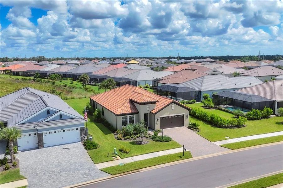Front exterior of a new home in , Englewood, FL, highlighting curb appeal (Image 25).
