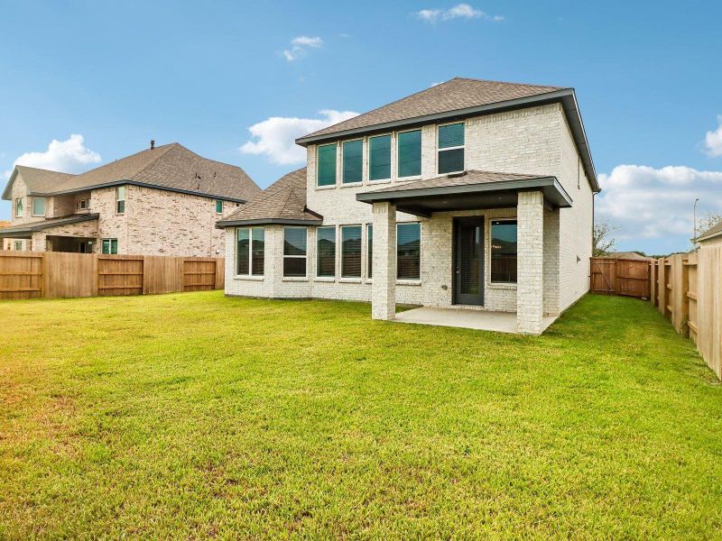 Exterior details and patio area of a home in Massey Oaks - Estate Series, Pearland (Image 24).