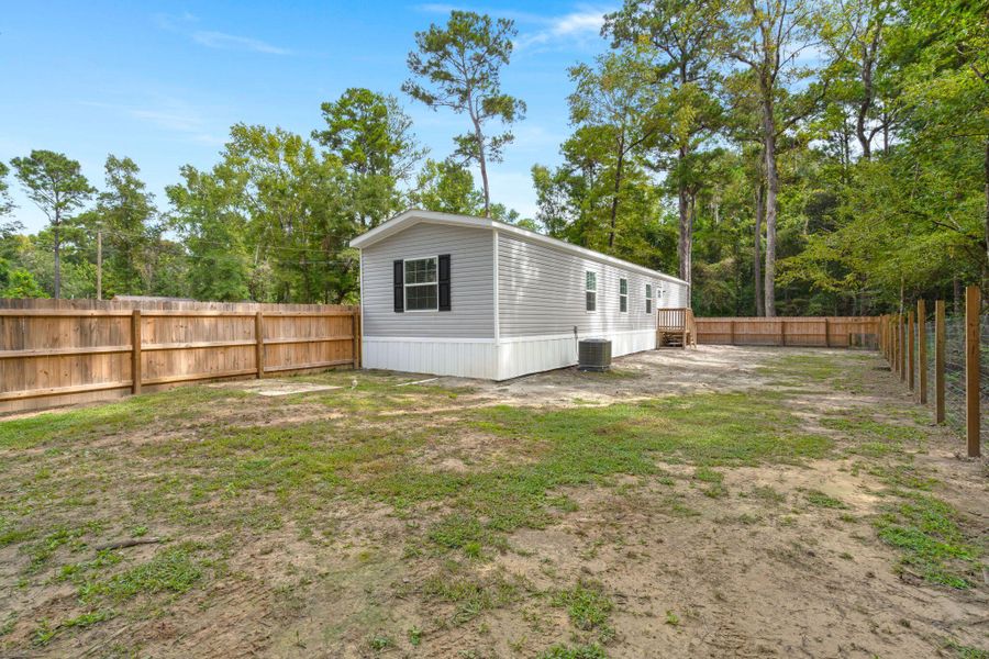 Exterior details and patio area of a home in , Ravenel (Image 14). Exterior details and patio area of a home in , Ravenel (Image 14).