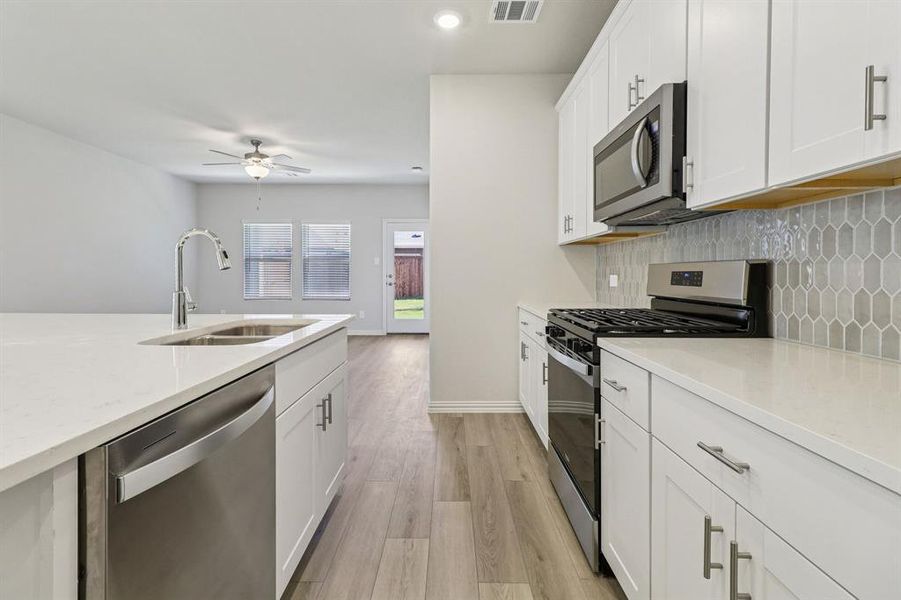 Furnished interior view inside a new home in Lakehaven - Spring Series, Farmersville (Image 9).