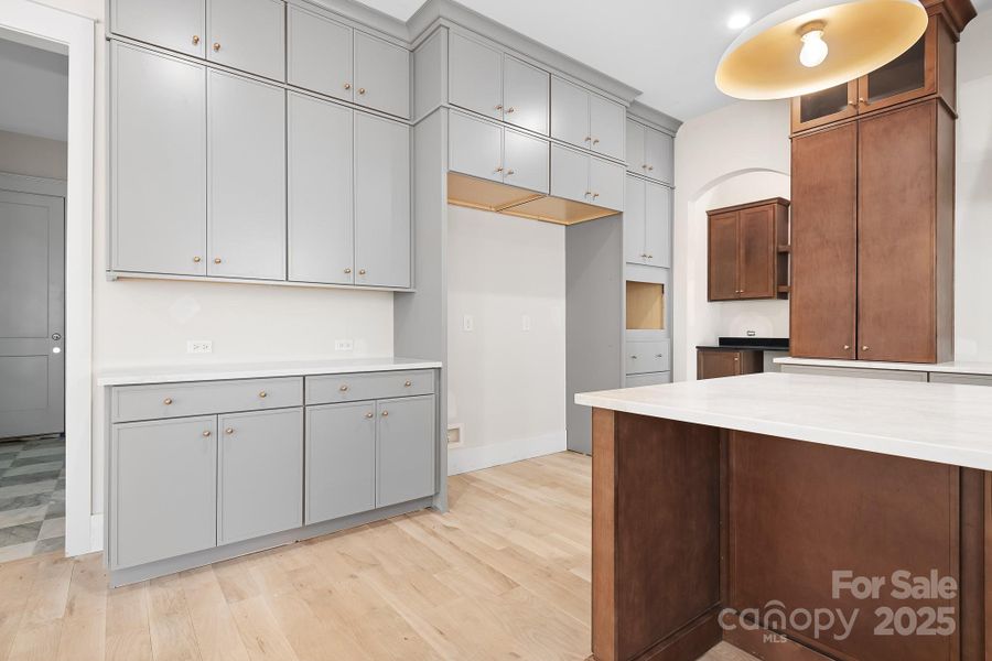 There is no shortage of cabinet and counter space. The kitchen leads to the beverage station and then a huge walk in pantry/scullery. Elegant. Functional. Timelss. Beautiful.