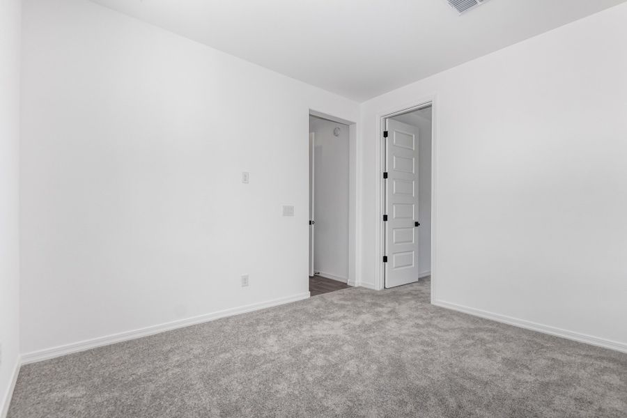 Representative unfurnished interior of a home built from the Winsor by Taylor Morrison in Allen Ranches Discovery Collection, Litchfield Park (Image 25).