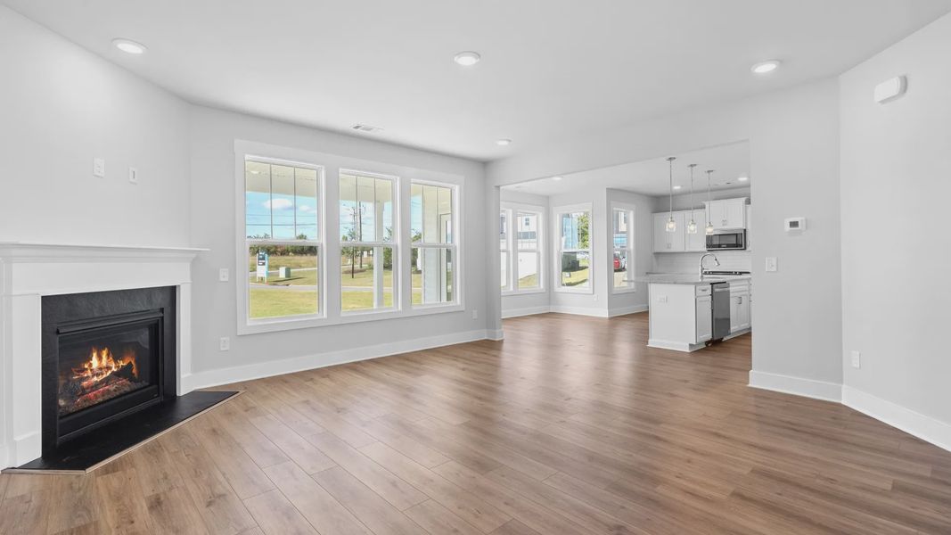 2 story single family home, all white, family room