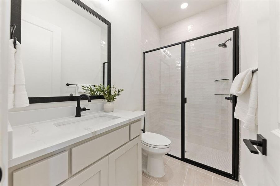 Friends and family will feel right at home in any of the beautifully finished guest baths.